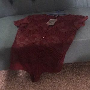 Short Sleeve Body Suit from Bebe. New